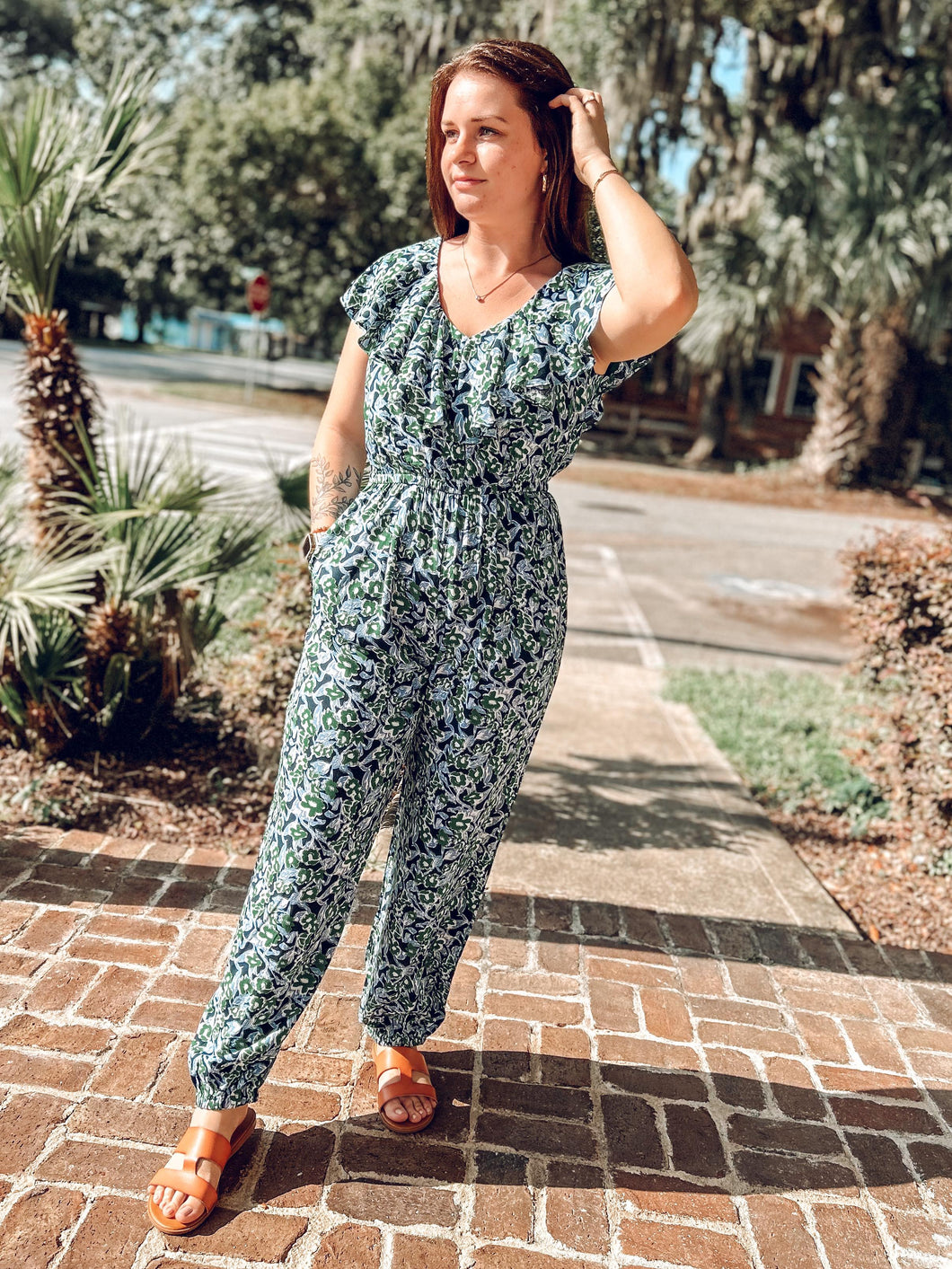 picture 1 woman wearing Everything Floral Jumpsuit