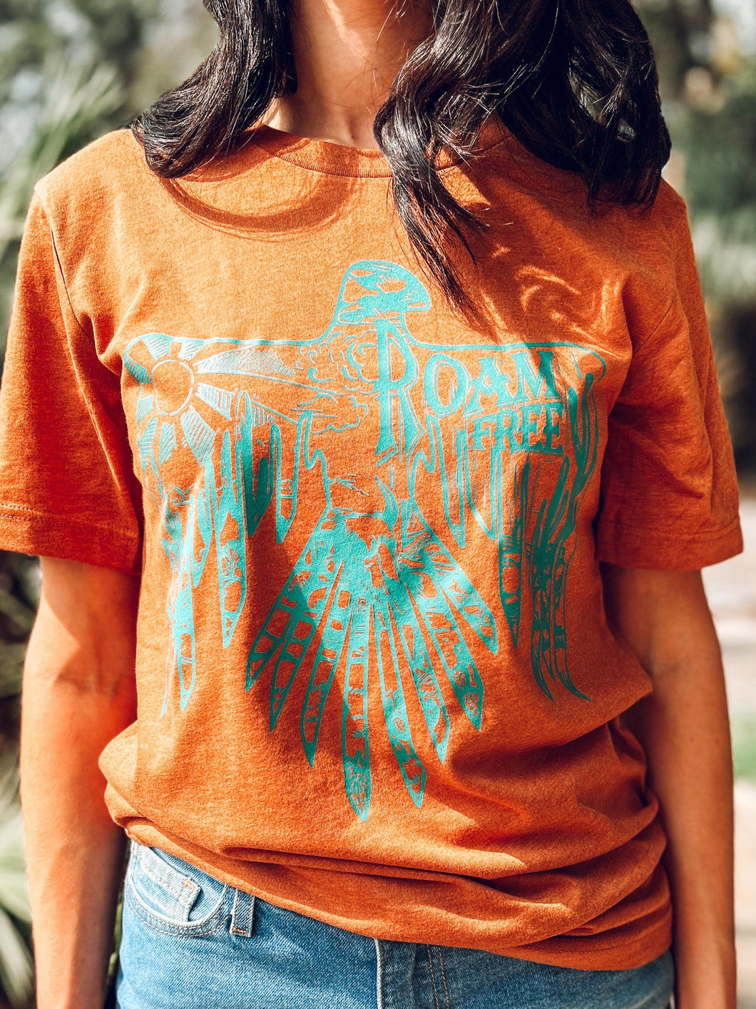 picture 1 girl wearing Roam Free Thunderbird Tee With Turquoise Graphic 