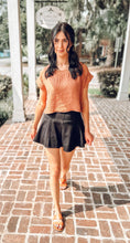 picture 2 girl wearing Risa Boxy Crop Top | Rust with black skirt 