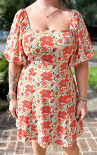 picture 3 girl wearing Vibe Retro Floral Dress | Orange 