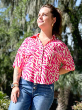 picture 1 of girl wearing Runnin Out Zebra Top | Pink