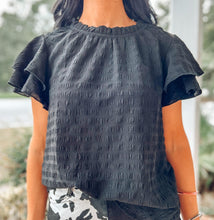 picture 2 close up of girl wearing Game Time Textured Top | Black 