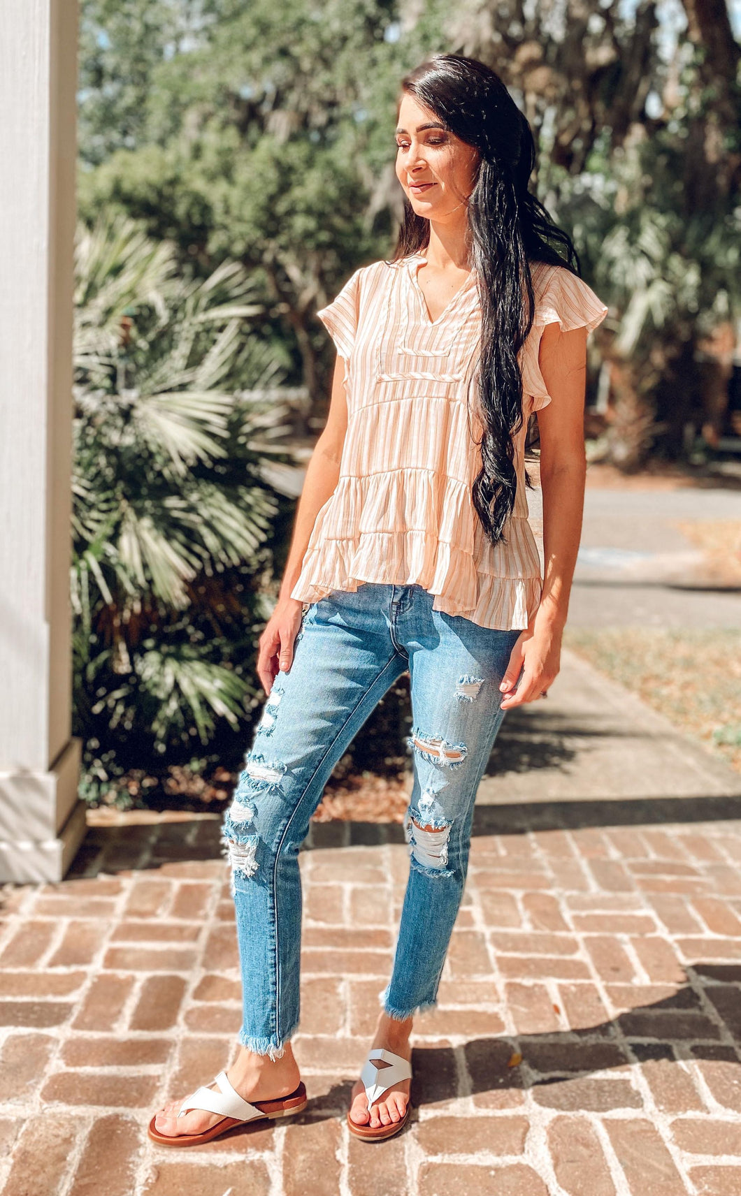 picture 1 woman in Leigh High Rise Distressed Denim