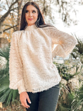 picture 1 woman in Cream Smocking Feather Top