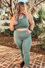 picture 1 woman in Exertion Curvy Leggings | Green