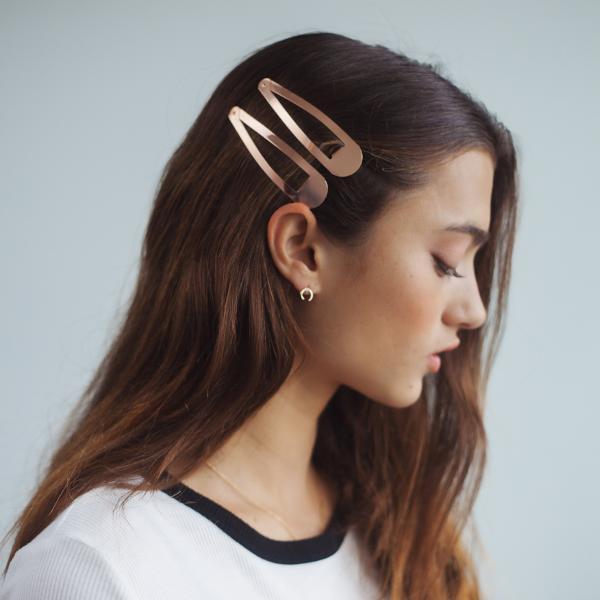 picture 1 woman using XL Snap Clips Rose Gold